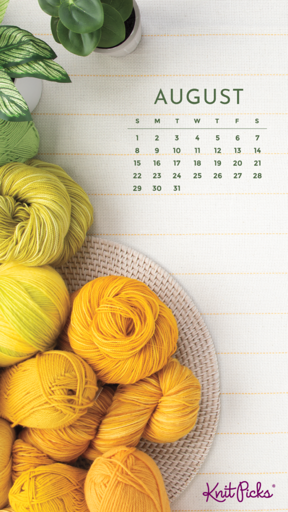 A top-down view of a tablecloth with assorted houseplants and yellow yarn, along with an August 2021 calendar.