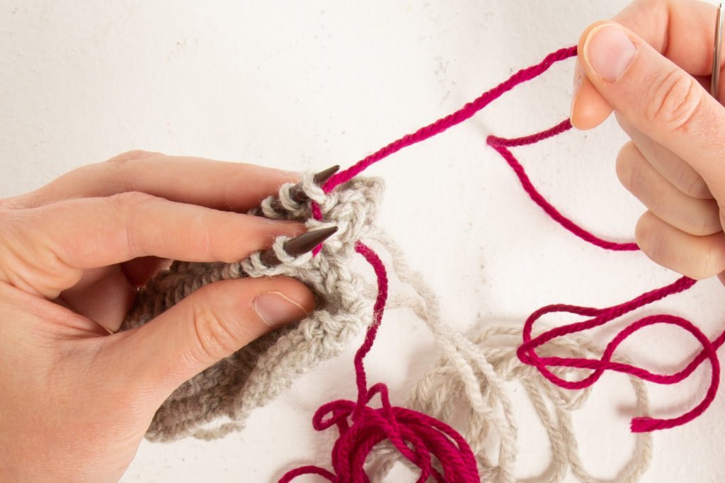 st st step 4: pull yarn through, leaving stitch on needle