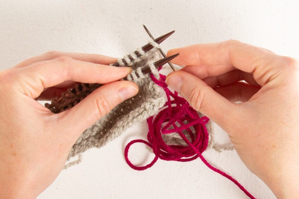 Setup step 2: through back first stitch knit-wise
