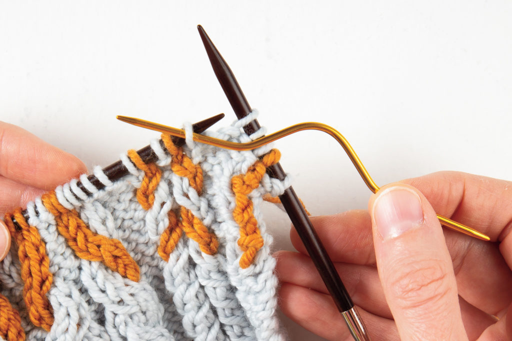 1-over-1 cable Left: slip first stitch to cable needle