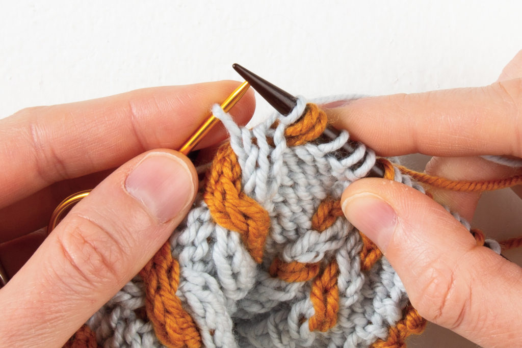 2-over-2 cable Left: first stitch knit from cable needle