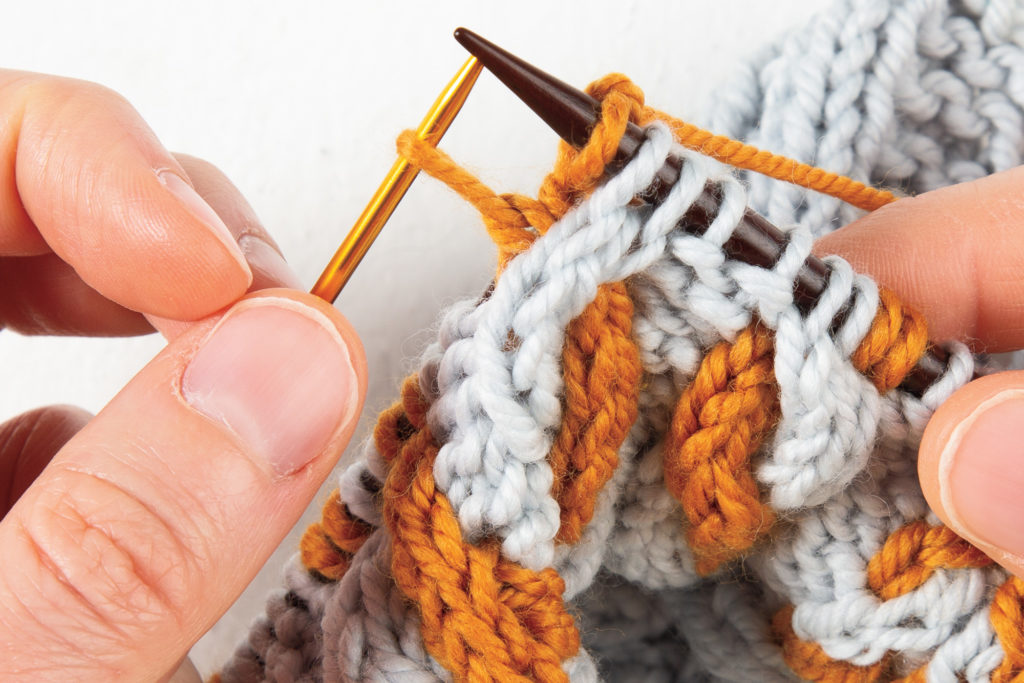 2-over-2 cable Right: first stitch knit from cable needle