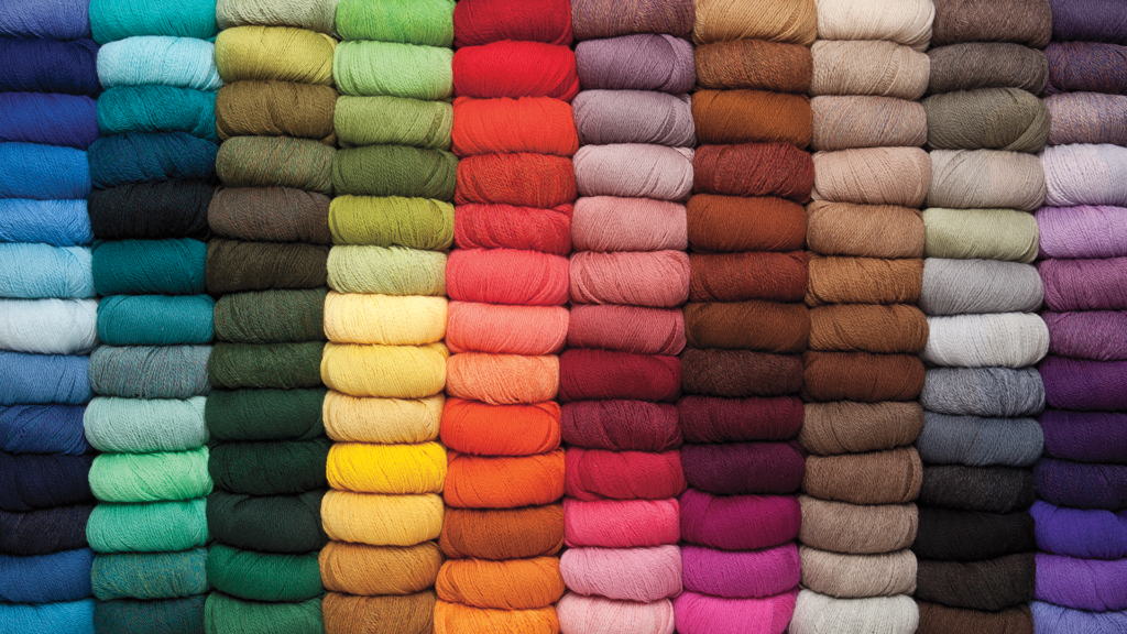 A lineup of all 150 of Palette Yarn's colors - a rainbow of yarn